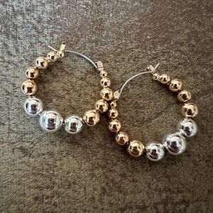 two tone ball graduated hoop earrings